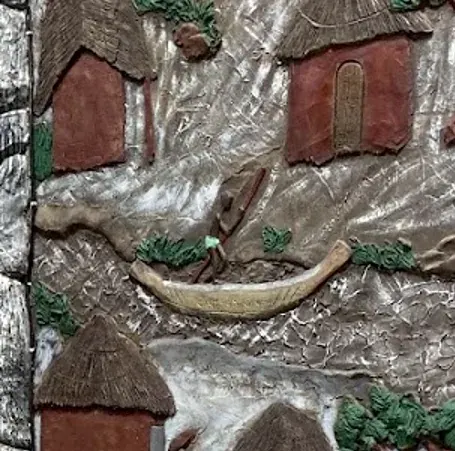 A carved canoe between round huts on the mural