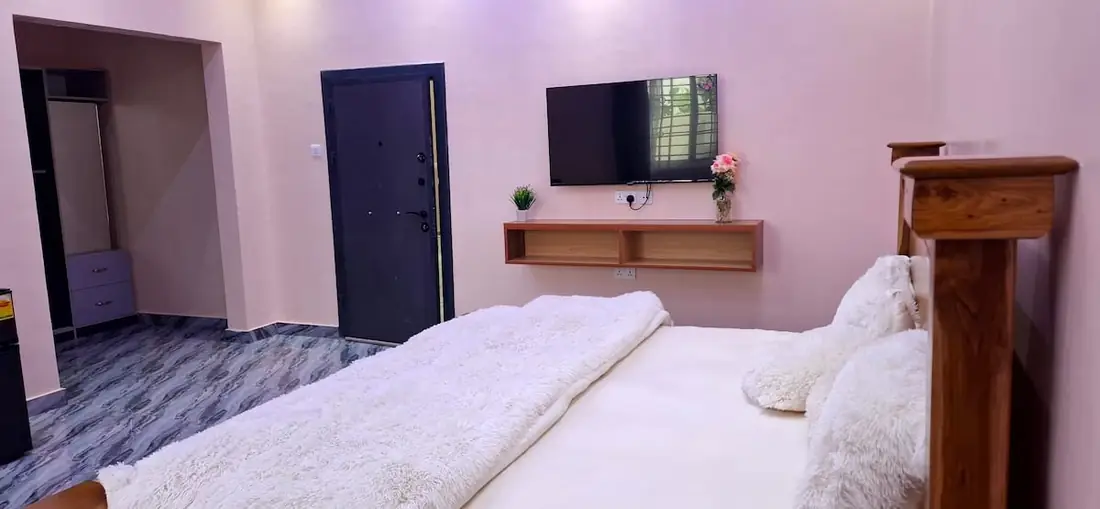 VVIP bedroom 2 with a king bed and a lit ceiling