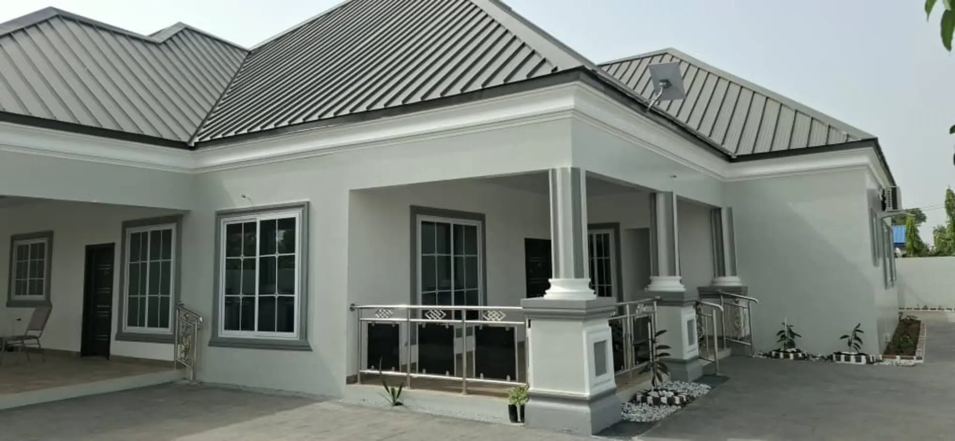 The VVIP Villa veranda with pillars and steel railings